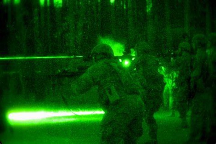 Does the military use red or green lasers?